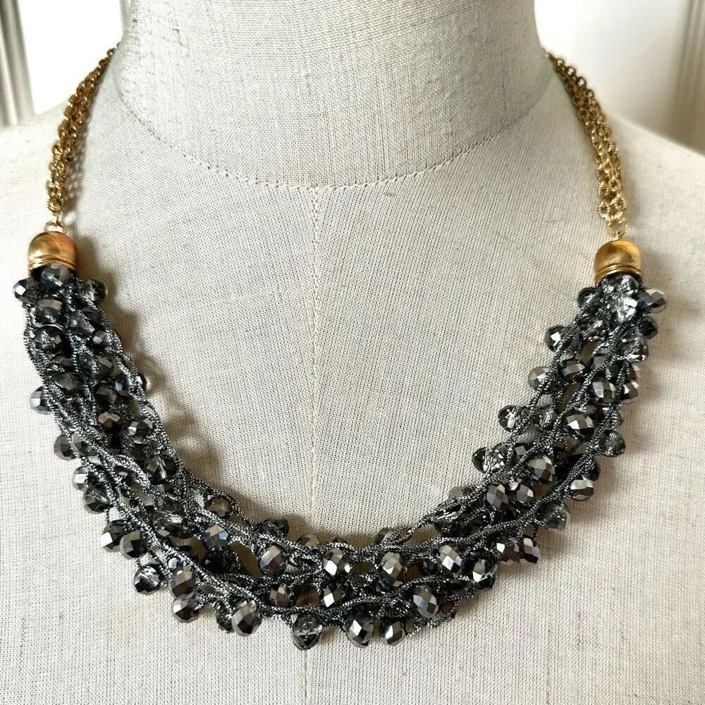 Grey beaded gold tone multi strand statement necklace